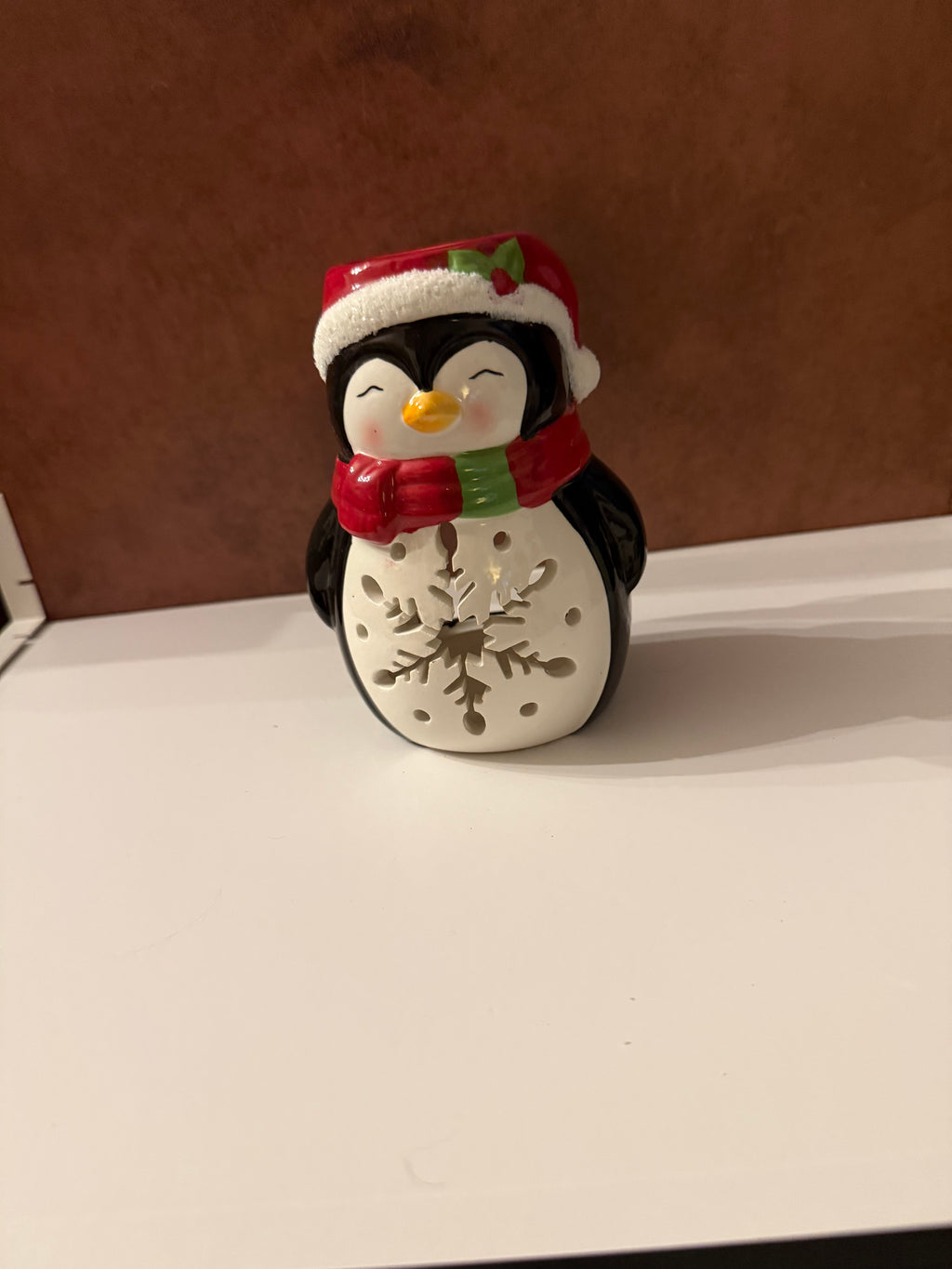 Penguin tea light hold