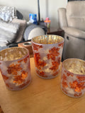 Fall decor, candleholders with candles on inside