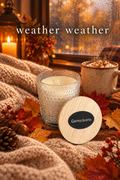 Candle with a cozy background and weather weather headline