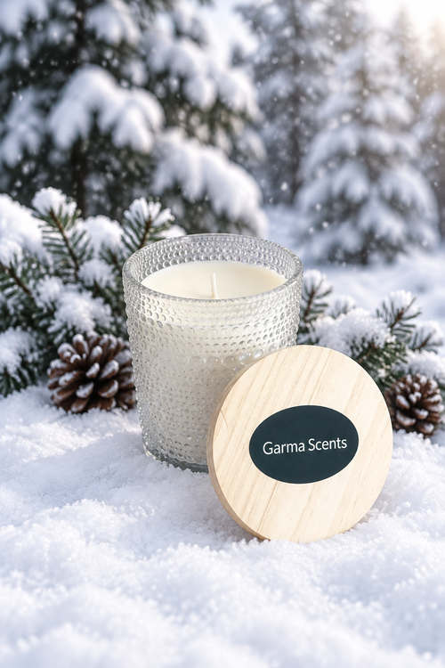 Candle with a snowy winter background